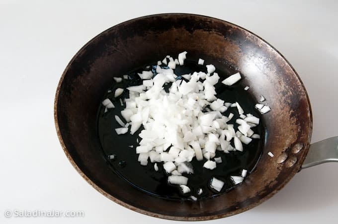 softening onions in a skillet