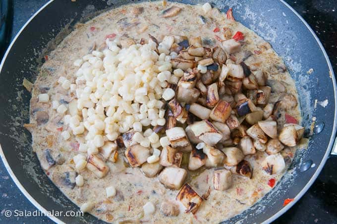 adding corn to skillet