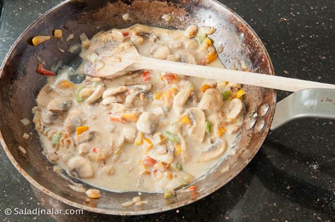 stirring the sauce until thickened.