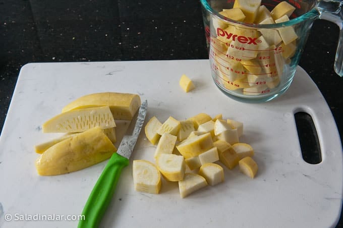 Dicing the yellow squash.