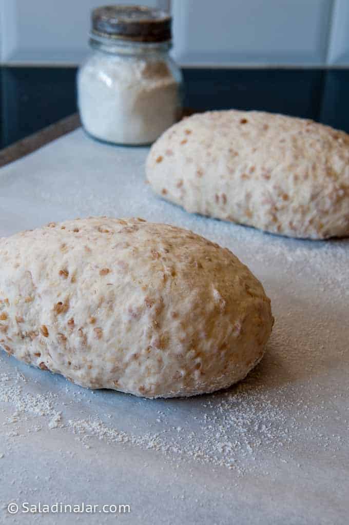 Place loaves on a prepared baking sheet and allow to rise until almost double in size.