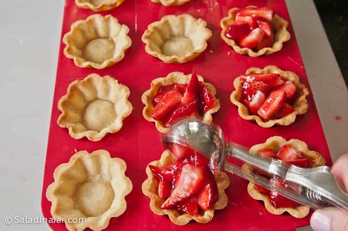 filling baked tart shells with strawberry filling