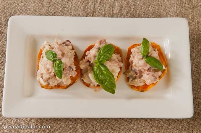 ham salad served on sweet potato slices