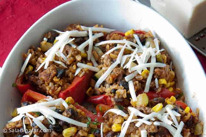 Jack cheese sprinkled over peppers