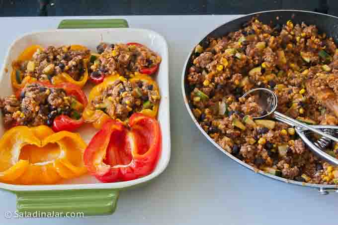 filling peppers with ice cream dipper