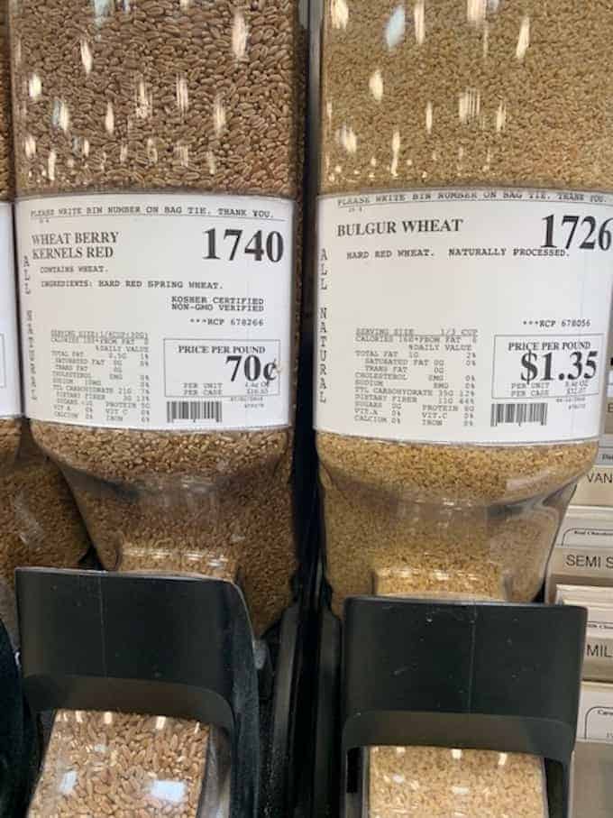 wheat berry kernels and bulgur wheat in bulk bin.