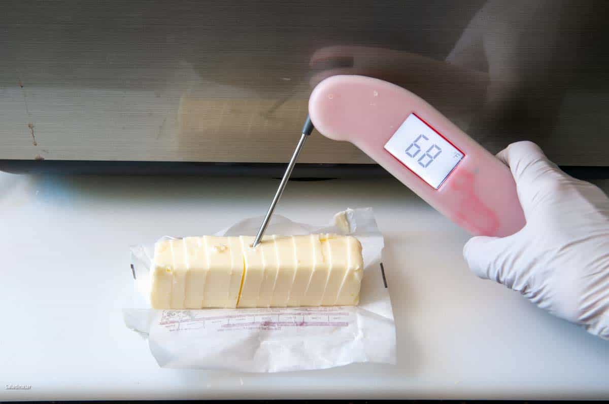 checking the temperature of the butter.