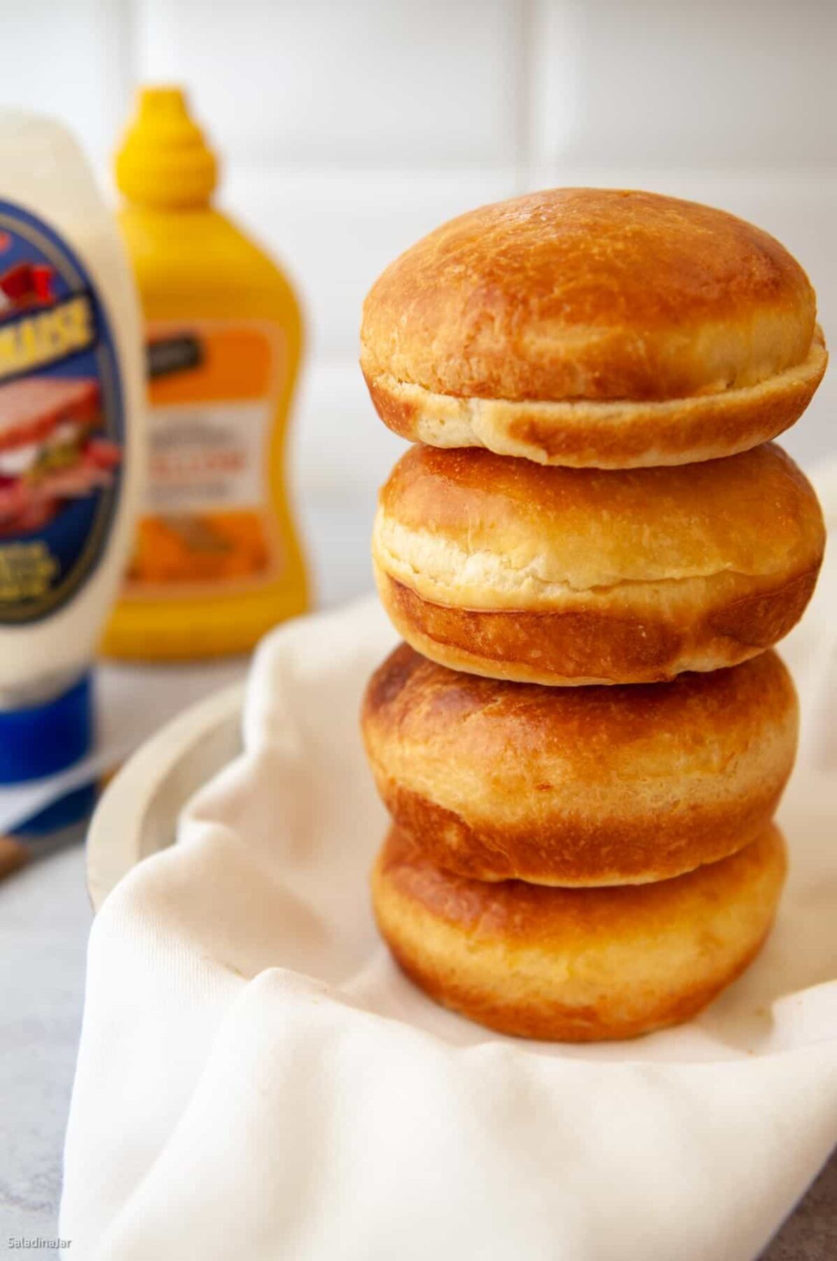 a stack of brioche buns