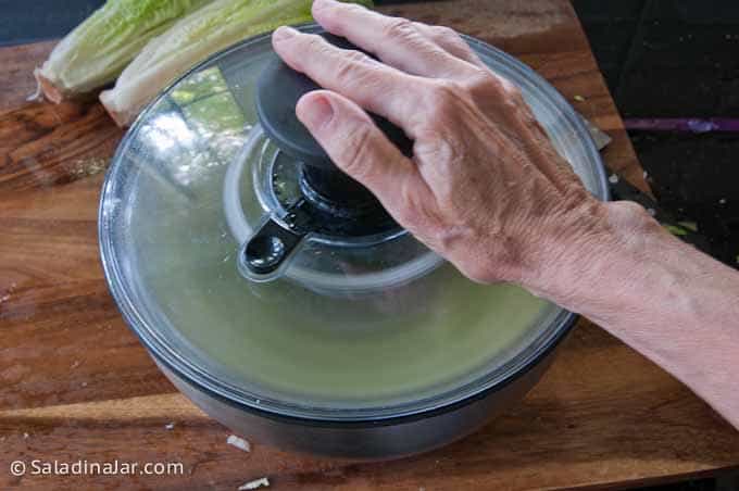 operating a salad spinner