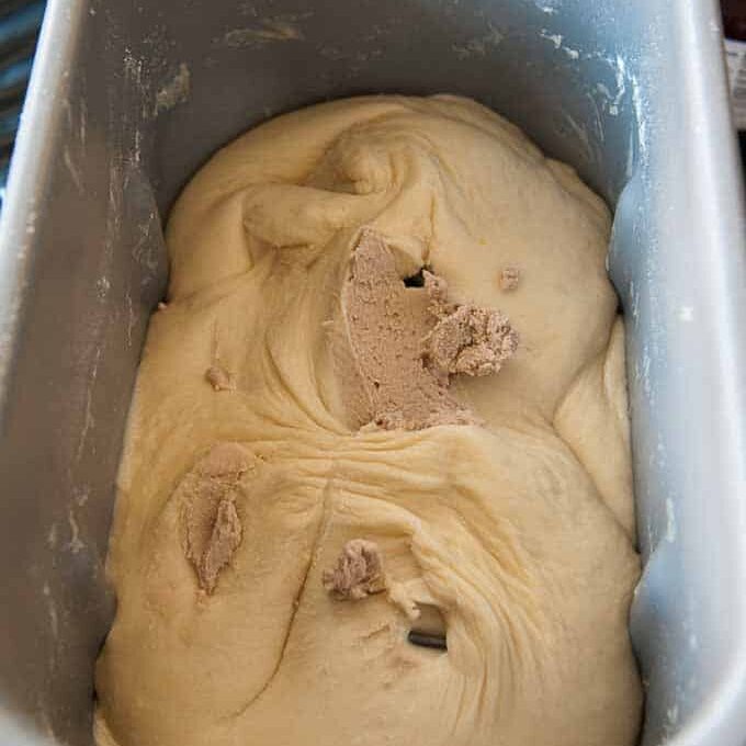 adding dissolved yeast to "already-mixed) bread dough