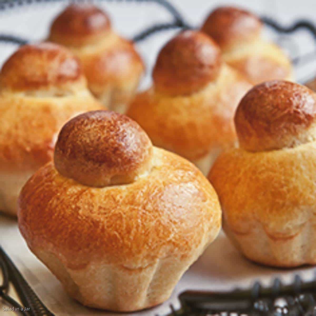 traditional brioche buns mixed in a bread machine on a fancy tray read to serve
