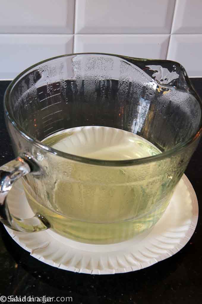 clear whey strained from yogurt with a coffee filter