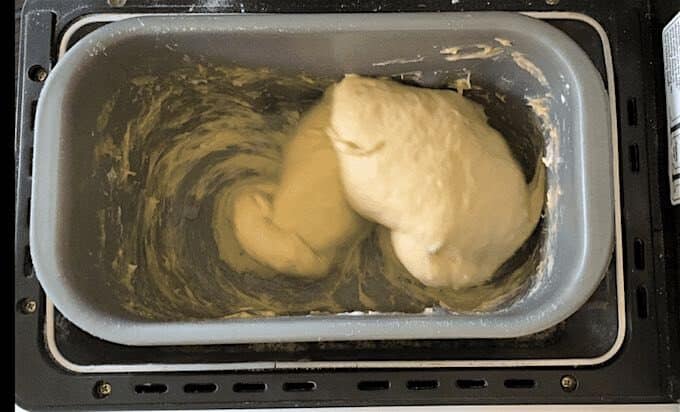 bread machine brioche dough after adding the butter