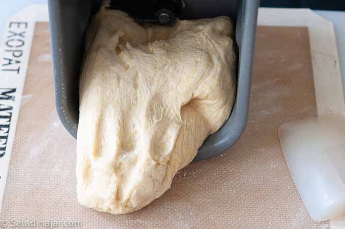 dough from the bread machine to a floured surface to be shaped by hand