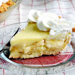 A slice of banana cream pie made with microwave pastry cream