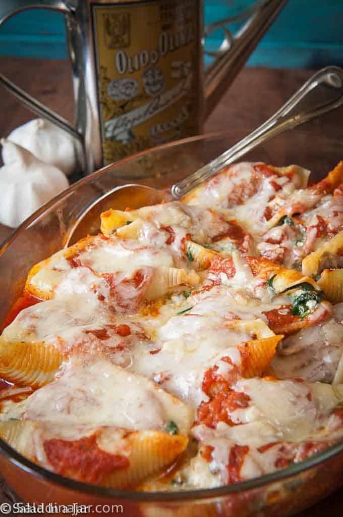 CHEESY SPINACH AND MUSHROOM STUFFED SHELLS--ready to eat in a casserole dish