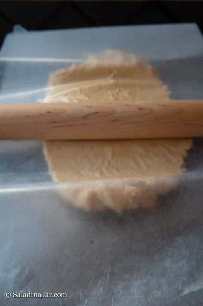 rolling out cookie dough (between 2 layers of wax paper)