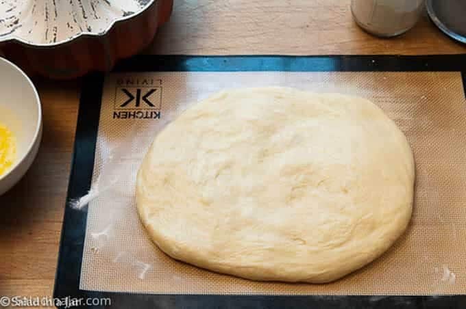 rolling out the dough into a rectangle