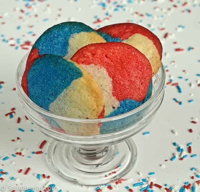 red, white, and blue cookies in a serving dish