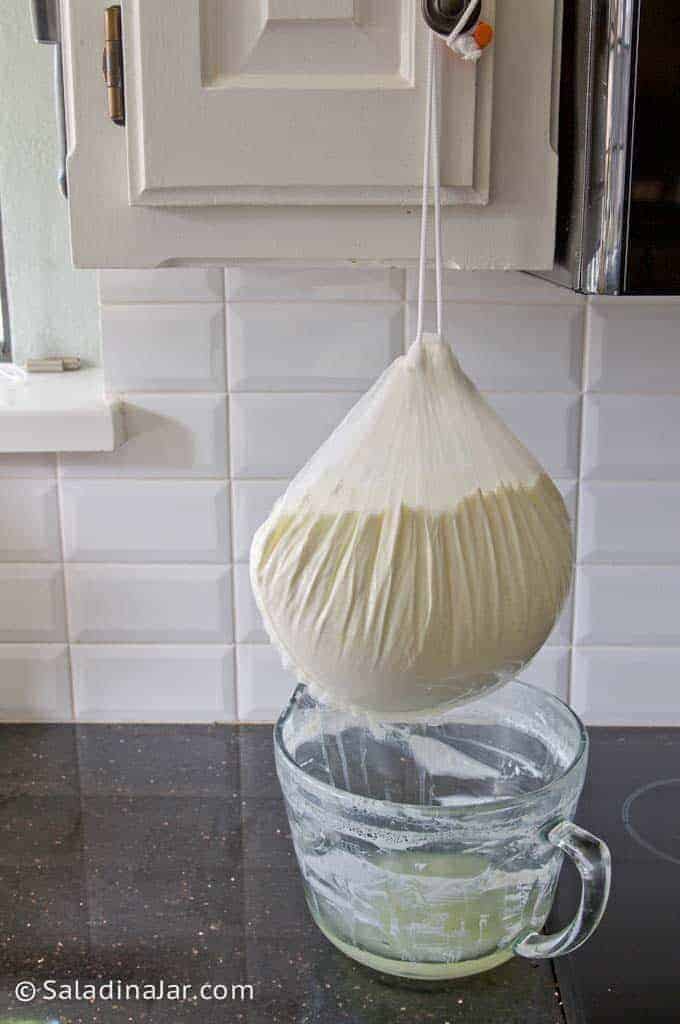 straining yogurt with a yogurt pouch