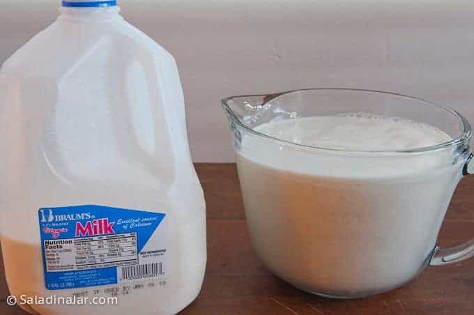 choosing a microwave-safe pyrex pitcher to heat milk
