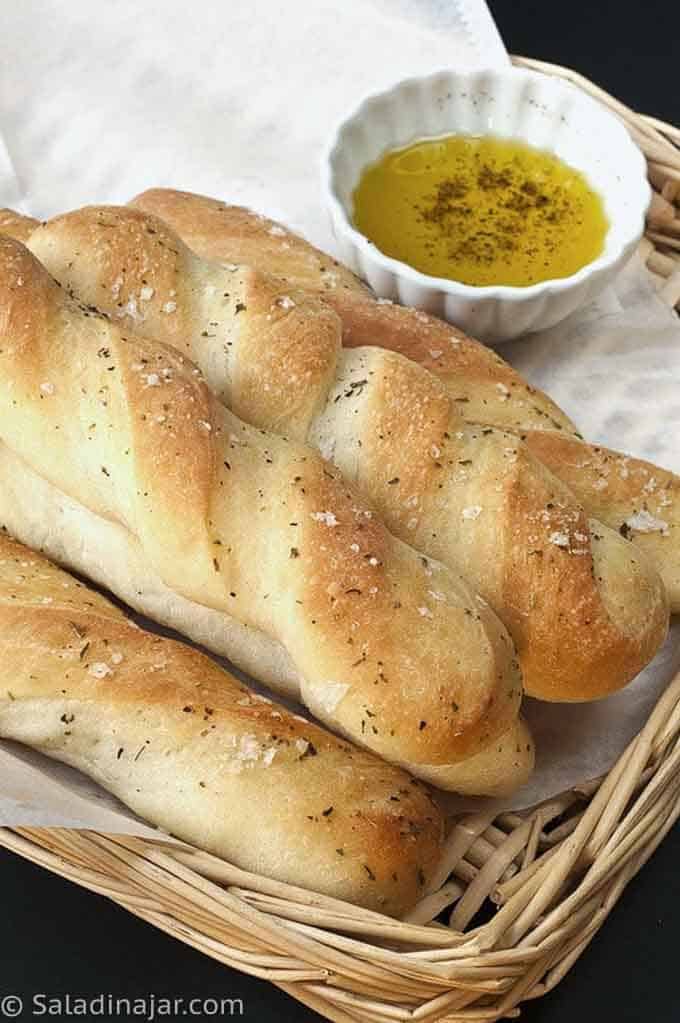 soft twisted garlic bread machine breadsticks with dipping oil