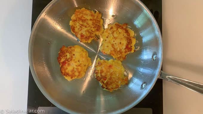 frying squash patties in skillet