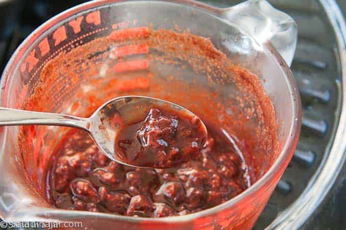 microwave strawberry reduction in a pyrex measuring cup.