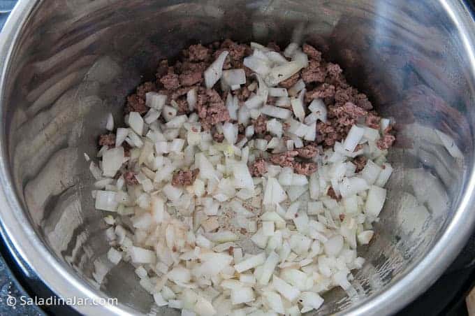 Onions added to the pot.