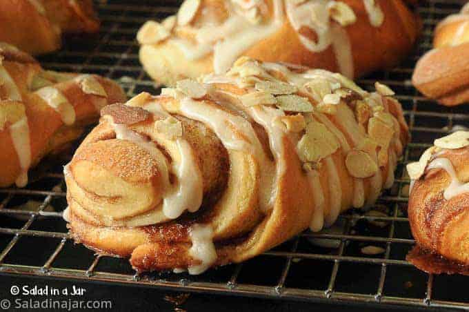 baked bear claws on a cooling rack.