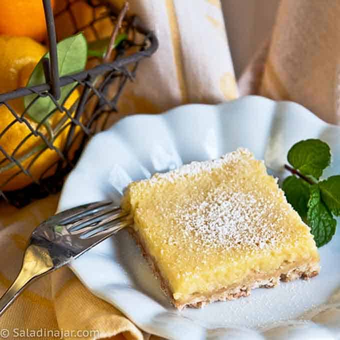 MEYER LEMON YOGURT SQUARE on plate with a fork