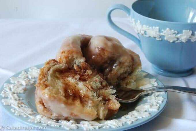 bread machine cinnamon roll on a plate with fork