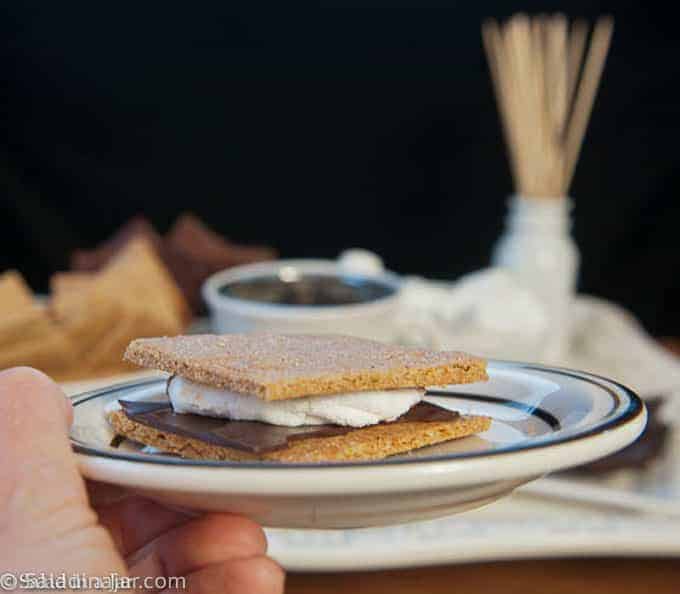 Smore on a plate with party tray in the background