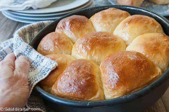 A pan full of Sweet Potato Yeast Rolls 