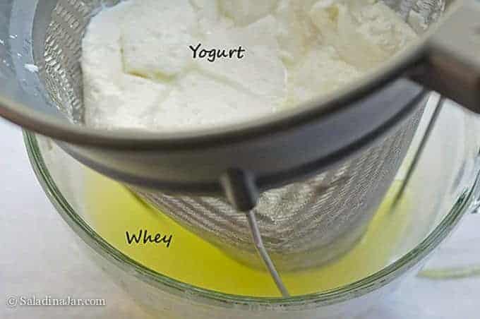 showing the process of separating or straining whey from yogurt