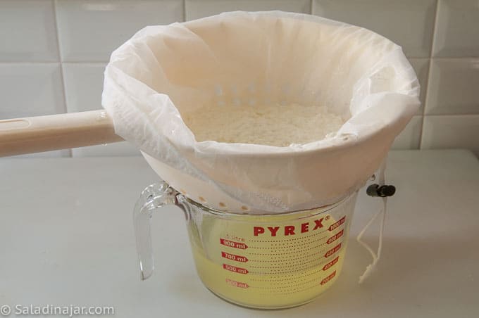 using a yogurt pouch to strain curds to make ricotta