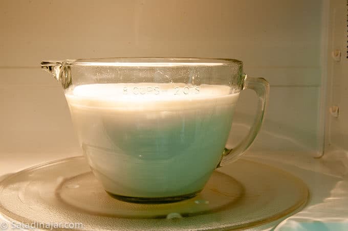 heating milk in a microwave.