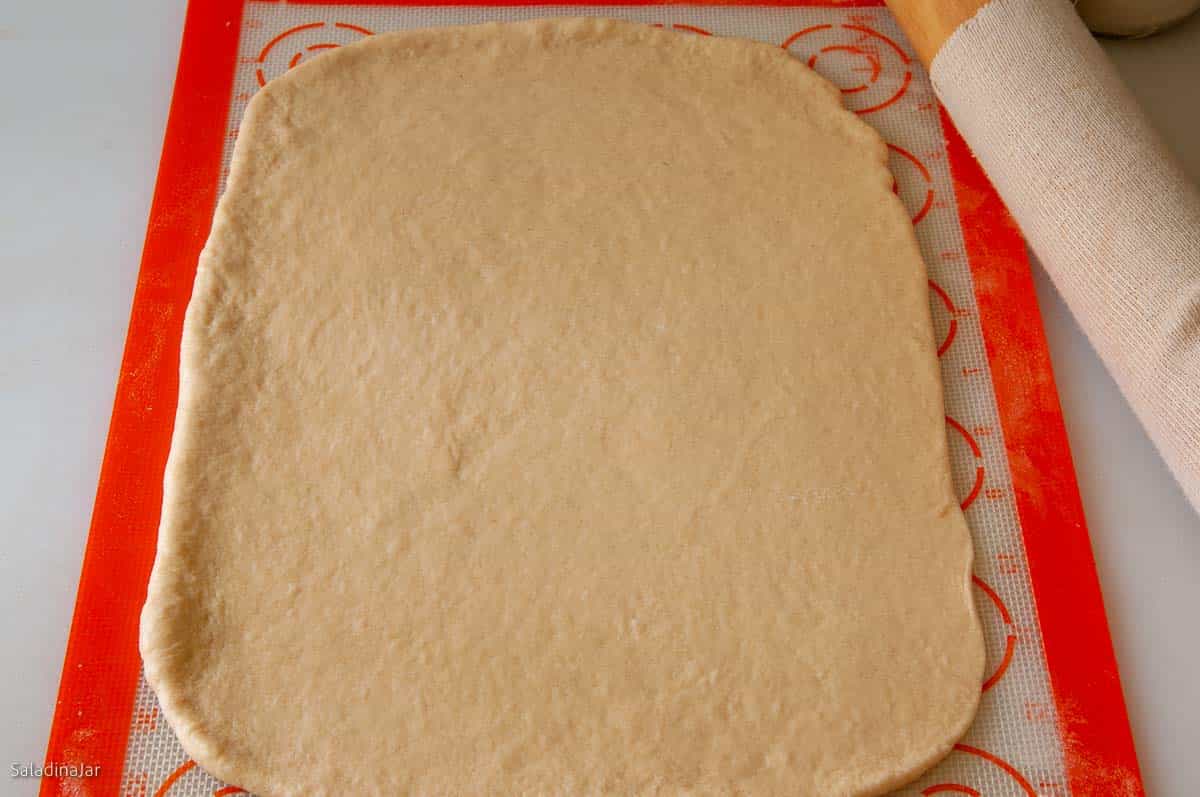 rectangle of dough ready to make rolls.