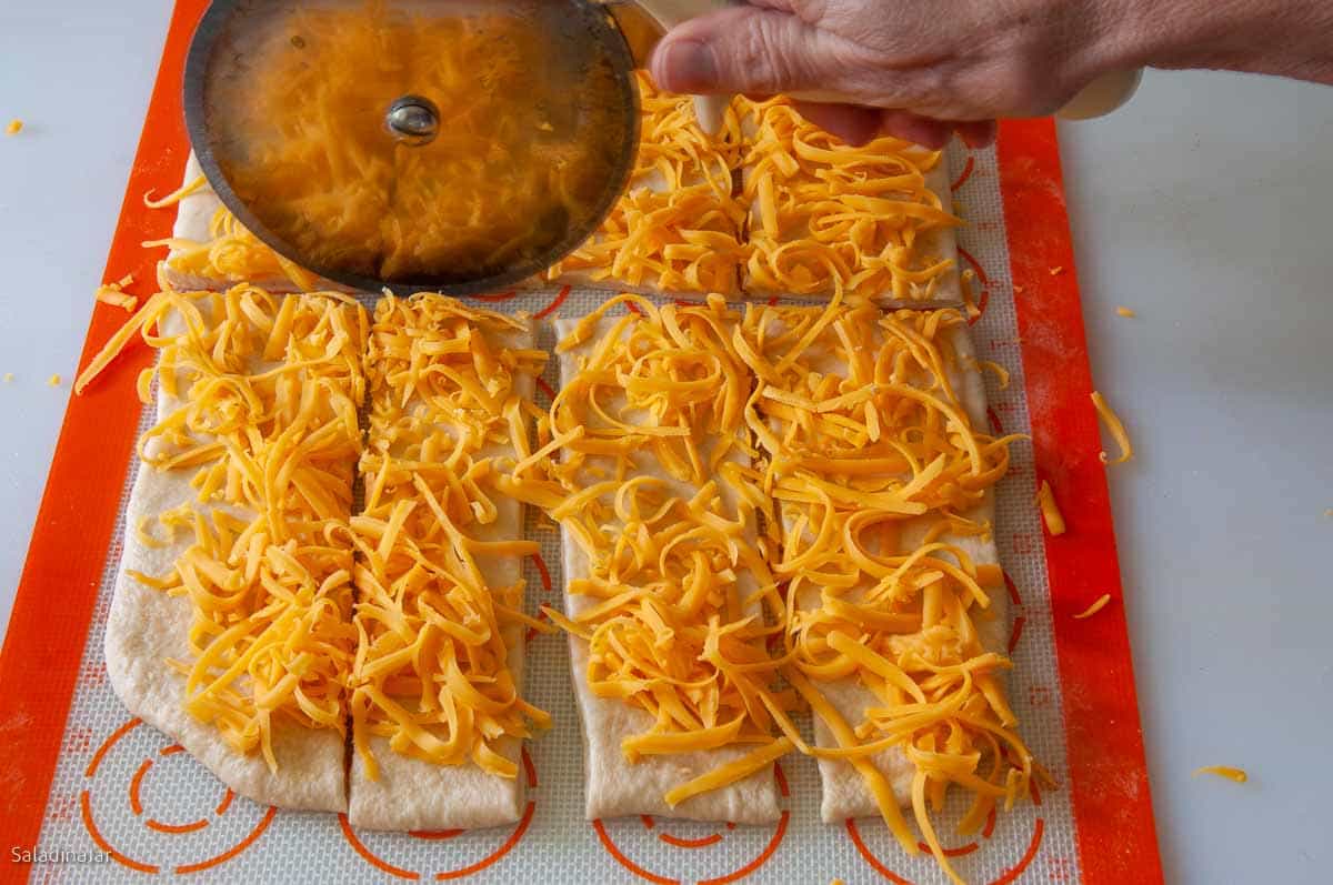 Cutting strips with a pizza cutter.