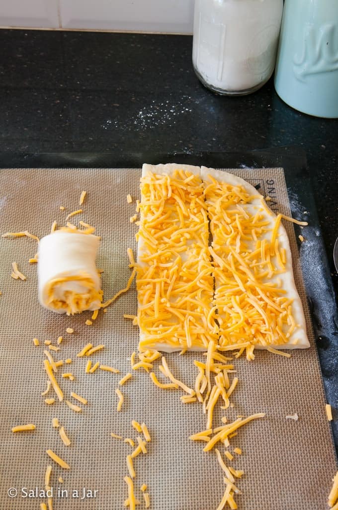 showing how to roll a cheese bread roll