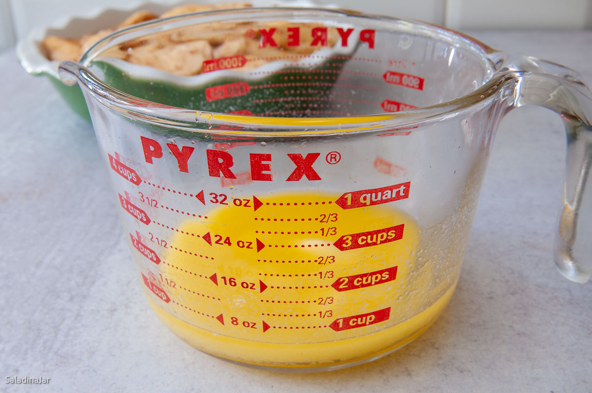 melted butter in Pyrex measuring cup