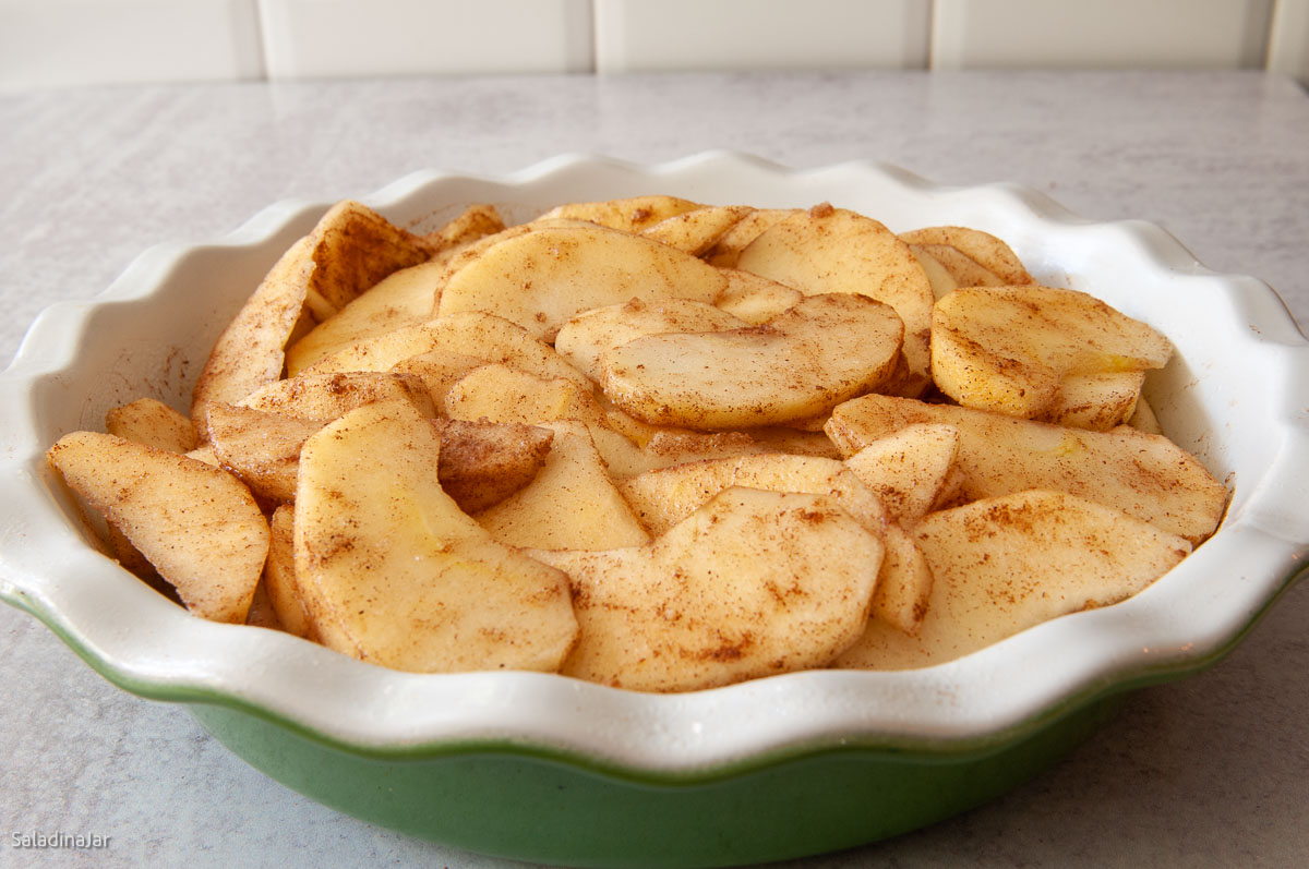 sliced apples with sugar and cinnamon.