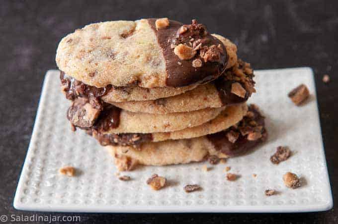 a tower of chocolate-dipped short bread cookies