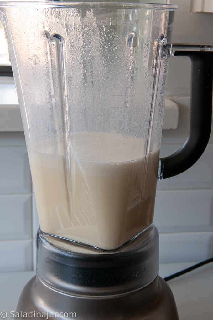 using a blender to combine ingredients for the filling