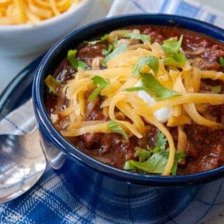 a bowl of chili with chocolate