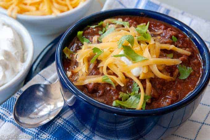 a bowl of chili with chocolate