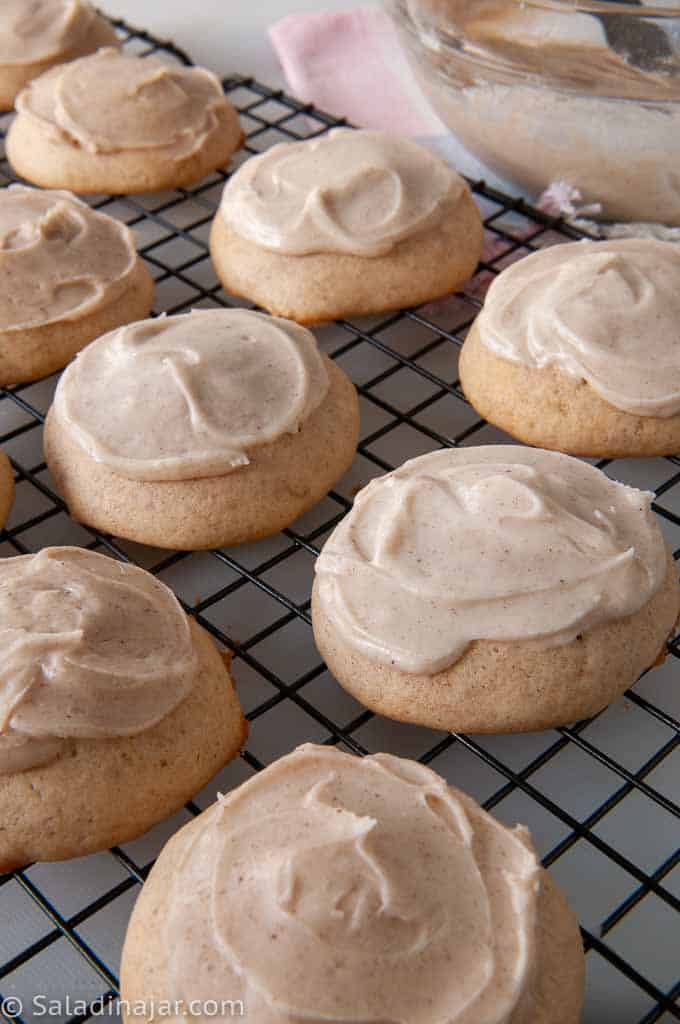 iced cinnamon jumbles on a cooling rack