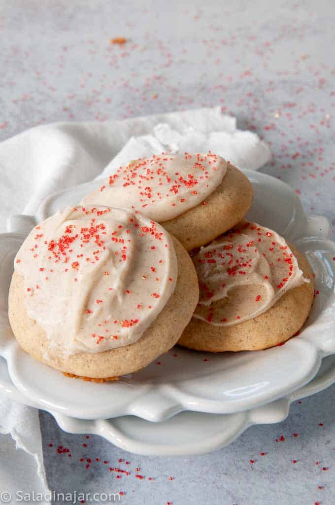 Iced cinnamon jumble cookies with red sugar on top