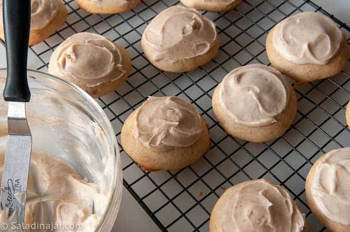 Cooling the cookies and applying the brown butter icing.