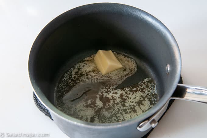 browning butter in a pan on top of the stove